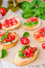 Bruschetta with tomato, onion and fresh basil