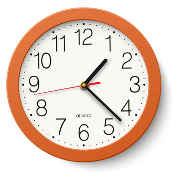 Classic round wall clock in orange body isolated on white