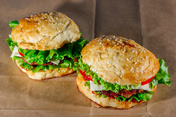 Fresh hamburgers on craft paper