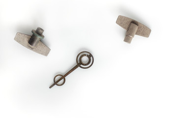 Clock winding / Part of clock winding on white background.