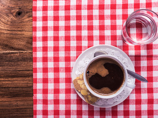 Obraz na płótnie Canvas coffee on checkered restaurant table