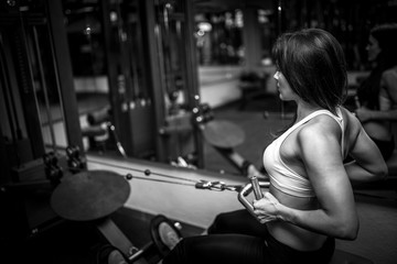 Woman in Gym Working Out
