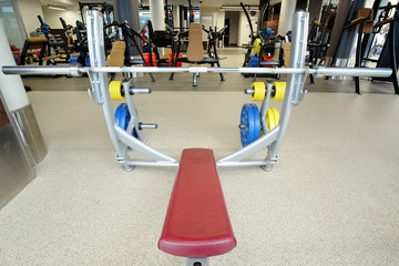 Fototapeta na wymiar Interior of a modern fitness hall with a bench