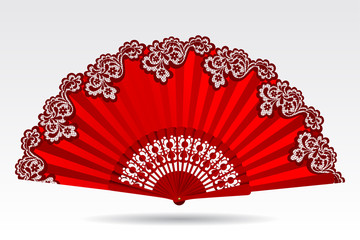 Open vintage folding red fan with a lace ornament