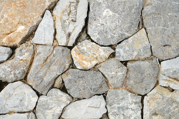 Big rocks arrange to build wall, background and pattern