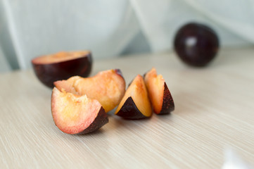 Ripe plums on a table