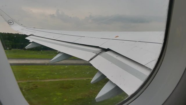 Lufthansa aircraft take off rainy day