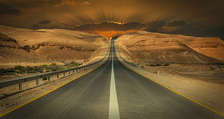 Road in desert of the Negev, Israel. Desert of the Negev is the biggest one in Israel

