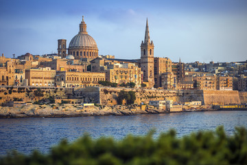Fototapeta na wymiar Valletta, Malta - The famous St.Paul's Cathedral in Valletta at sunset