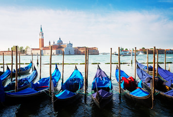 Fototapeta na wymiar Gondolas floating in the Grand Canal, Venice