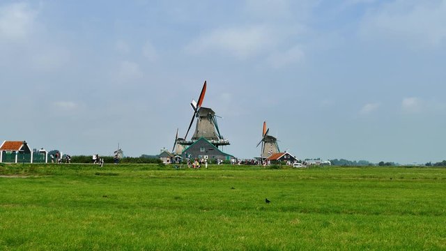 Classic Dutch windmill at Famous tourist location of Zaanse Schans at the outskirts of Amsterdam