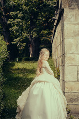 small girl in white dress outdoor