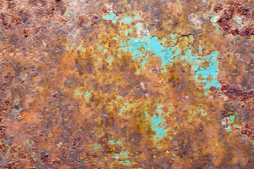 A background of peeling paint and rusty old metal