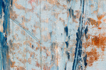 A background of peeling paint and rusty old metal