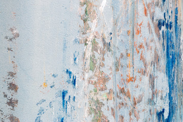 A background of peeling paint and rusty old metal