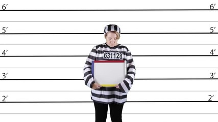 Mature woman in prison uniform holding chalkboard on white lineup background.