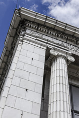 Fototapeta na wymiar Corner of an Old Bank Building with Greek Columns I