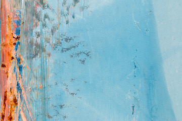 A background of peeling paint and rusty old metal