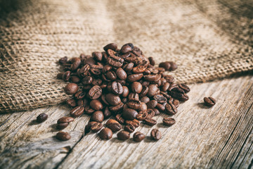 Coffee beans on a wooden surface