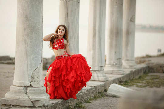 Bellydancer little girl dancing outdoors