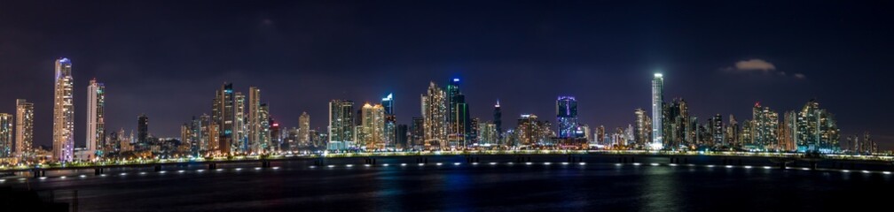 Fototapeta na wymiar Panoramic view of Panama City Skyline at night - Panama City, Panama