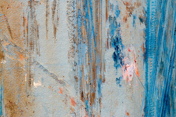 A background of peeling paint and rusty old metal