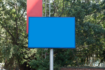 Large blank billboard on a street wall, banners with room to add your own text