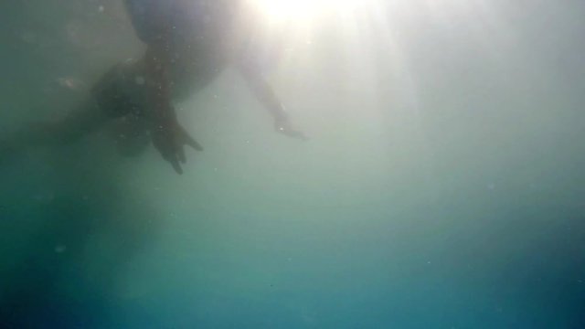Underwater clip of todler child swimming SLOW MOTION