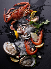 Fresh Seafood ,Crab Shrimp Oyster on stone background
