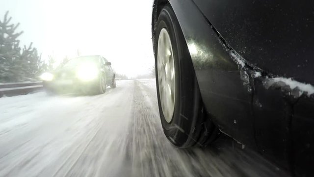 Wheel While Driving on Snow road and Passing 