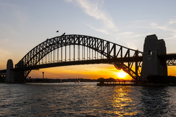 Fototapeta na wymiar A spectacular sunset at Sydney Harbour bridge