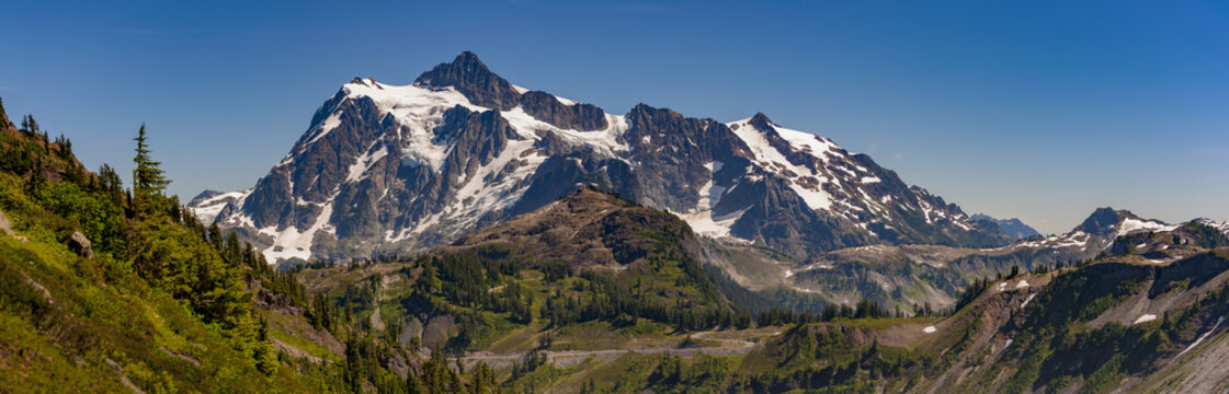 Mt. Shuksan, Washington.  Mount Shuksan may be one of the most photographed mountains in the Cascade Range seen here on the Chain Lakes Loop Trail. Mt. Baker National Forest.