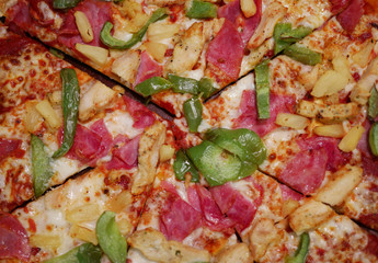 Closeup of delicious fresh pepperoni and pepper pizza
