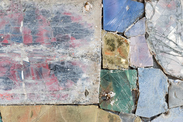 Colorful old stone mosaic on the wall.