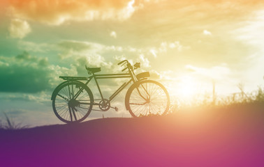 Fototapeta premium beautiful landscape image with Bicycle at sunset