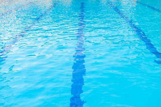 Blue water and laens in swimming pool