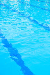 Blue water and laens in swimming pool