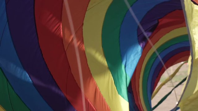 Floating multi-colored parachute