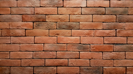 Red brick wall with water drops