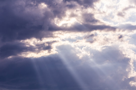 Sunbeam through the haze on blue sky, clud with sunlight