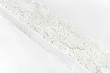 patterned textile fragment of white cloth