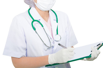 Medical female doctor making notes in document