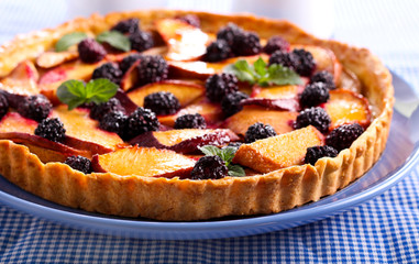 Fruit and berry tart on plate