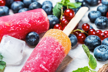 popsicles with red currants and blueberries  