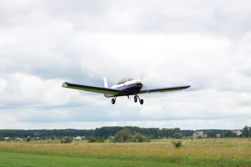 Fototapeta na wymiar Small plane takeoff