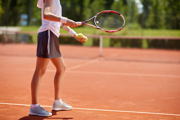 Fototapeta na wymiar Tennis player serving tennis balls