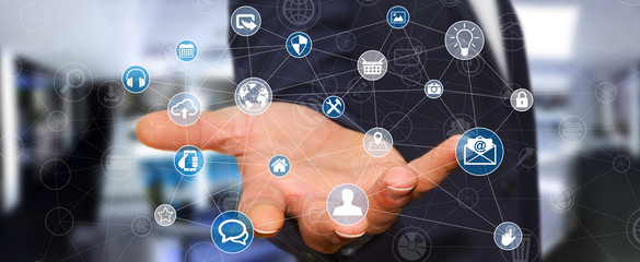 Businessman holding multimedia network 3D rendering