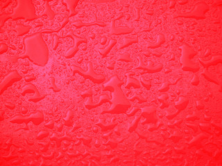 Water stains on red surface