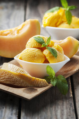 Fresh ice-cream with melon and mint