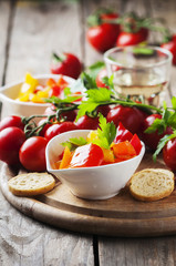 Italian sweet-sour paprika with bread and tomato